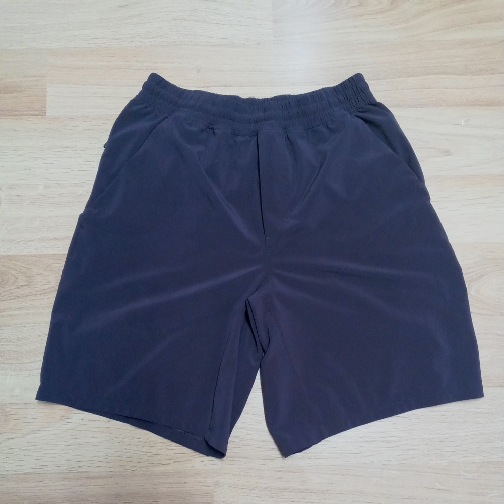Lululemon Workout Running Shorts Solid Pattern Size Medium Unlined Brown Color.
